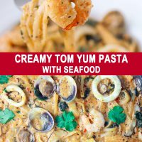 Fork with piece of shrimp at the tip and Creamy Tom Yum Pasta with seafood in large pan