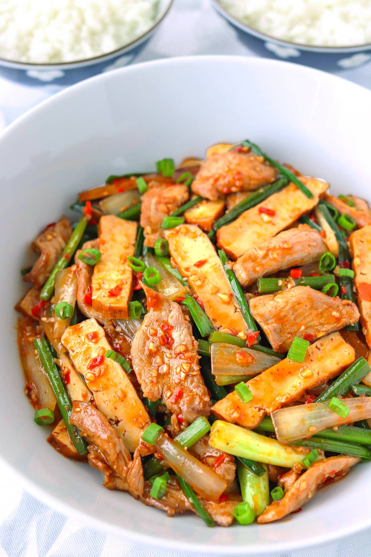 Stirfried Garlic Scapes with Pork & Tofu That Spicy Chick