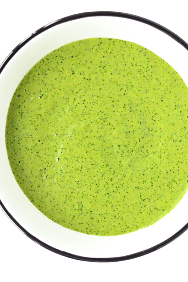 Close-up top view of bowl with Coriander and Mint Sauce.