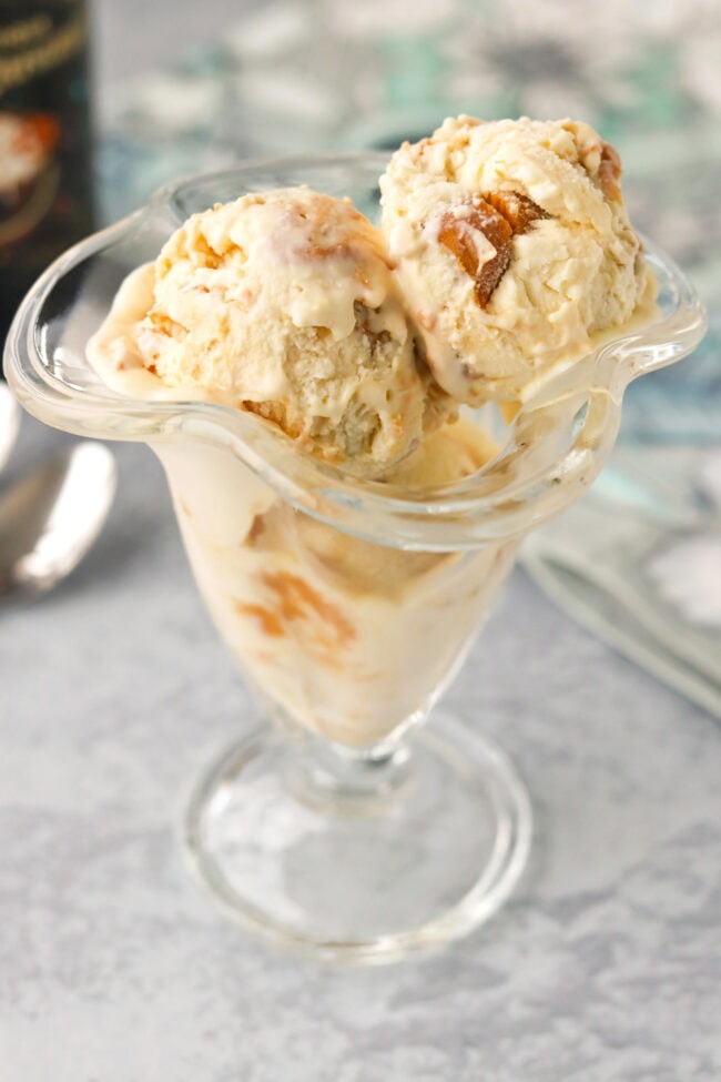 Close-up front view of Baileys Salted Caramel Peanut Butter ice cream in a dessert glass.