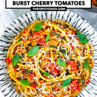 Cherry tomatoes and bucatini pasta dish on a plate and in pan. Text overlay "XO Sauce Pasta with Ground Pork & Burst Cherry Tomatoes" and "thatspicychick.com".