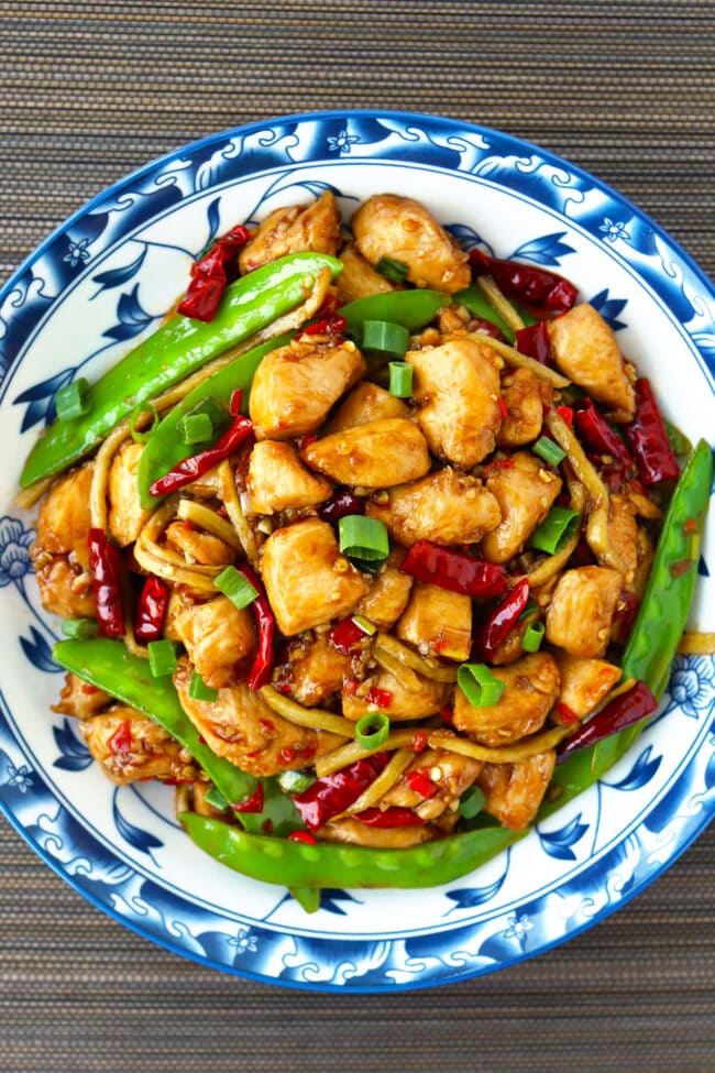 Top view of plate with chicken in vinegar sauce stir-fry dish.