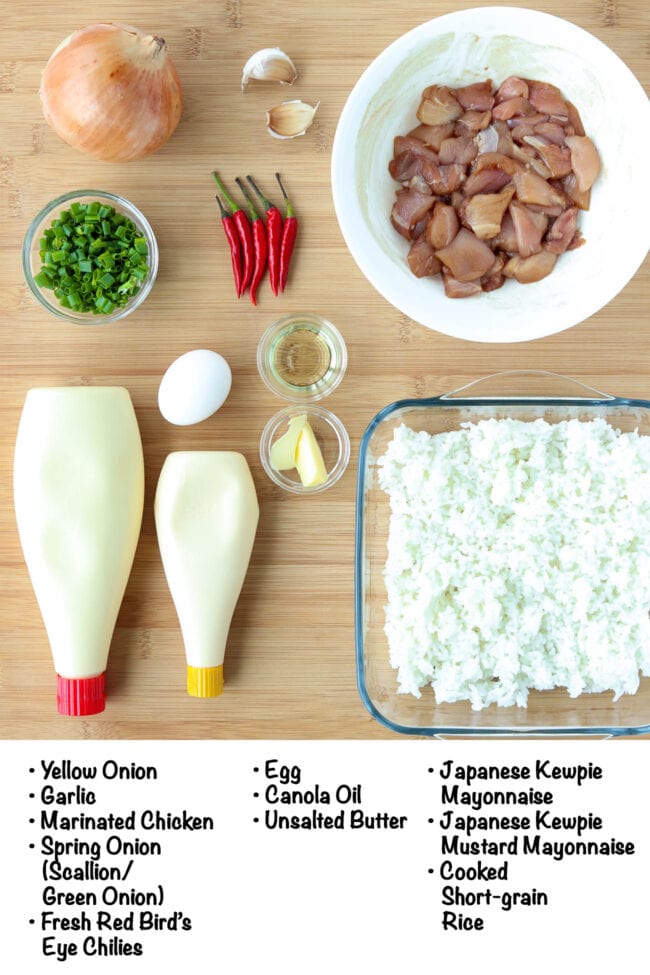 Labeled ingredients for Japanese Chicken Fried Rice on a wooden board.