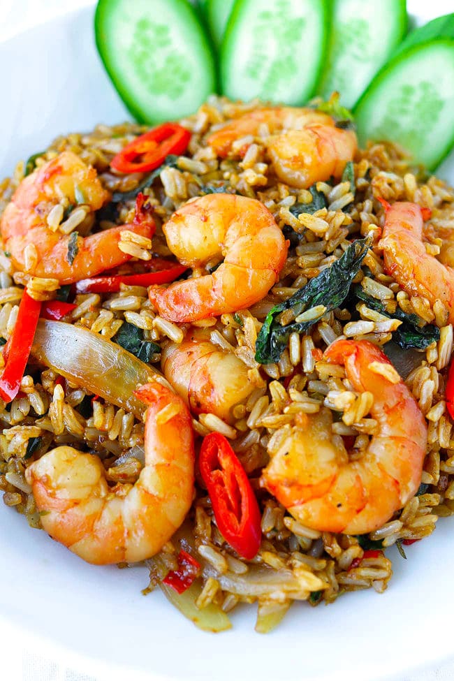 Front closeup view of Thai basil shrimp fried rice on a plate.