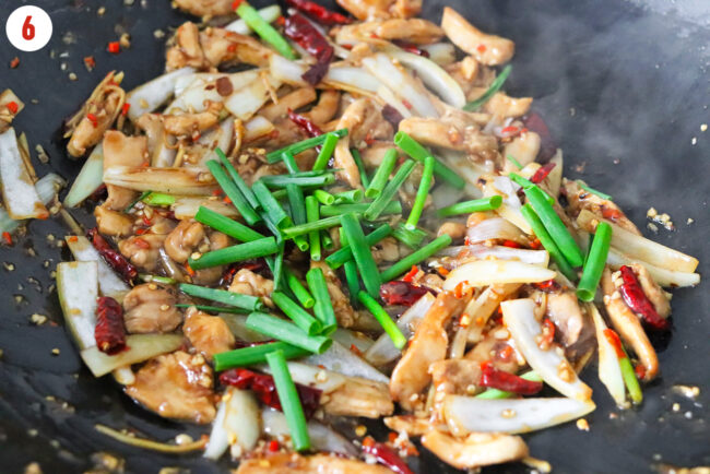 Added spring onion batons to wok with 5-spice chicken stir-fry.