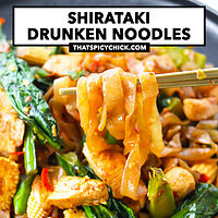 Chopsticks pulling up a bite of noodles from a plate with stir-fried noodles with chicken. Text overlay "Shirataki Drunken Noodles" and "thatspicychick.com".