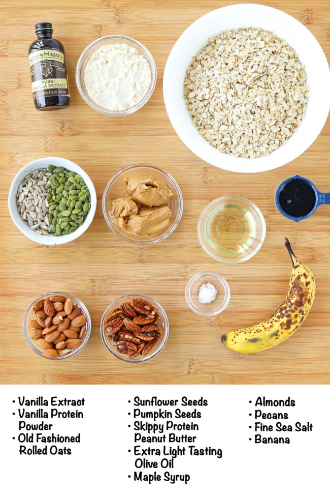 Labeled ingredients for peanut butter banana protein granola on a wooden board.