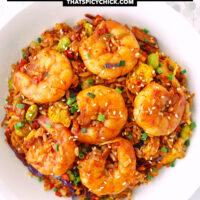 Plate with shrimp fried rice. Text overlay "Korean Gochujang Fried Rice" and "thatspicychick.com".