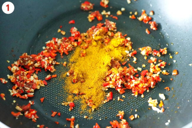 Added curry powder to wok with sautéed aromatics.