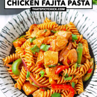 Front view of plate and pan with chicken pasta. Text overlay "One Pot Chicken Fajita Pasta" and "thatspicychick.com".