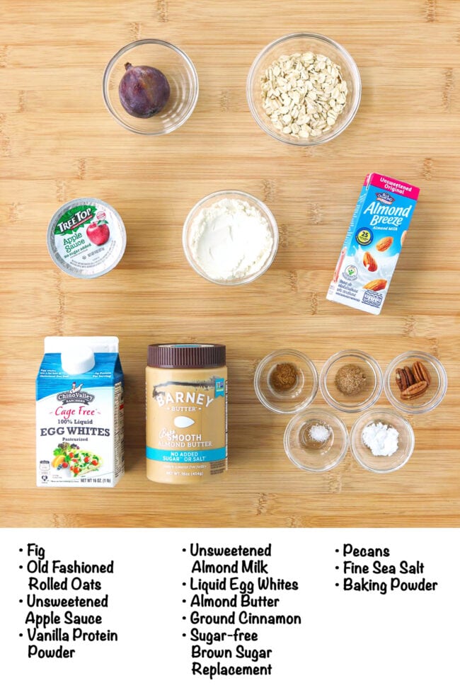 Labeled ingredients for almond butter baked oats with figs on a wooden board.