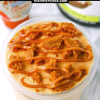 Pint container with pumpkin pie protein ice cream, Biscoff cookie and caramel syrup. Text overlay "Ninja Creami Pumpkin Pie Ice Cream" and "thatspicychick.com".