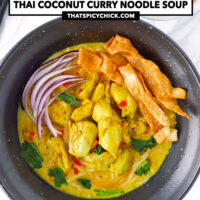 Khao soi with chicken in bowl topped with sliced red onion, wonton strips and coriander. Text overlay "Easy Khao Soi", "Thai Coconut Curry Noodle Soup" and "thatspicychick.com".