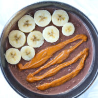 Chocolate peanut butter banana overnight oats in a bowl.