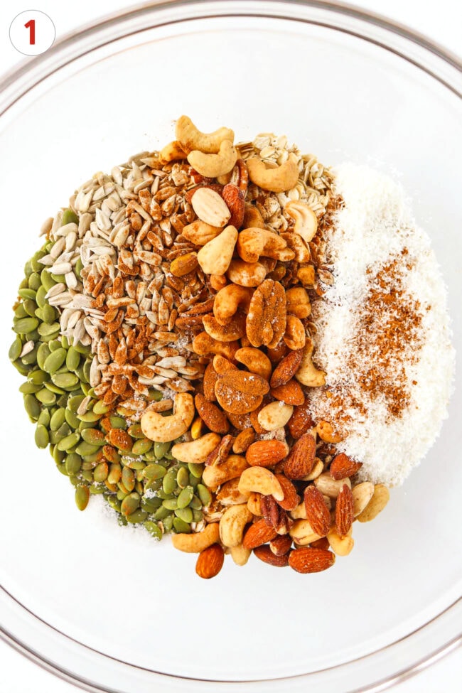 Dry ingredients for granola in a large mixing bowl.