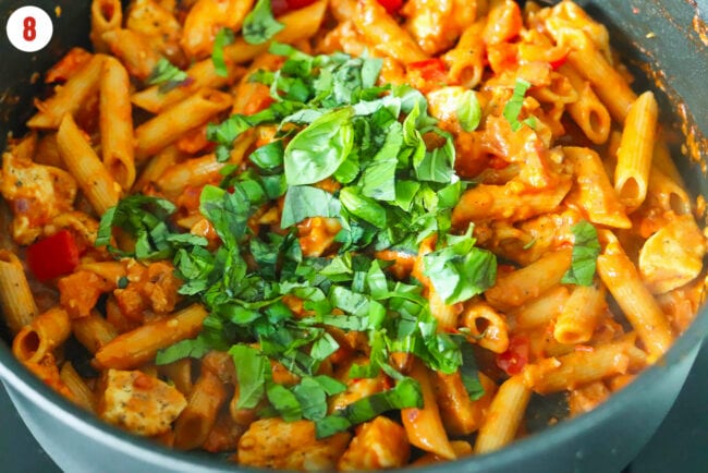 Added sliced basil to pan with Spicy Chicken and Bacon Tomato Pasta.