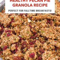 Pecan granola clusters on a baking tray. Text overlay "Healthy Pecan Pie Granola Recipe", "Perfect for Falltime Breakfasts!", and "That Spicy Chick".