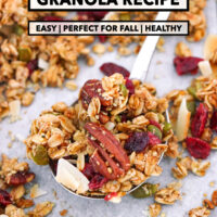 Closeup of spoon with crispy pecan spice granola on a baking tray. Text overlay "Pecan Pie Granola Recipe", "Easy | Perfect for Fall | Healthy", and "That Spicy Chick".