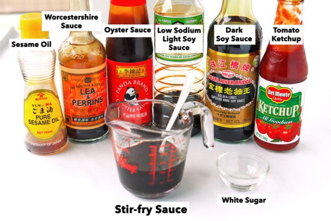 Yakisoba sauce ingredients and measuring cup with yakisoba noodles sauce.