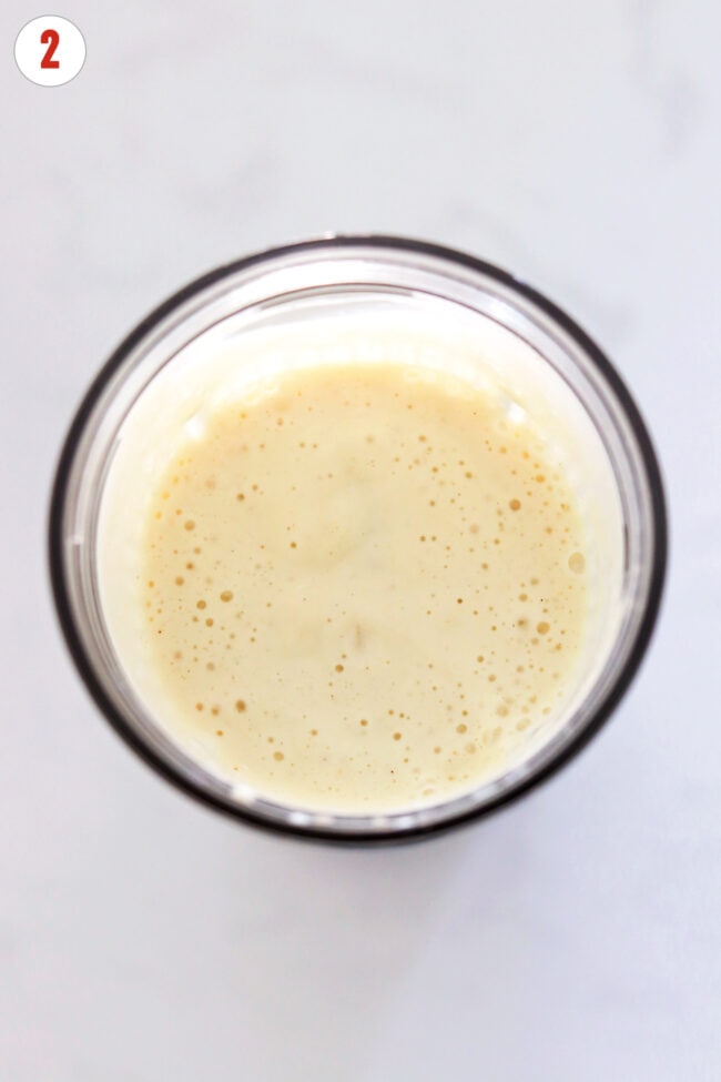 Blended silken tofu sauce in a mini blender.