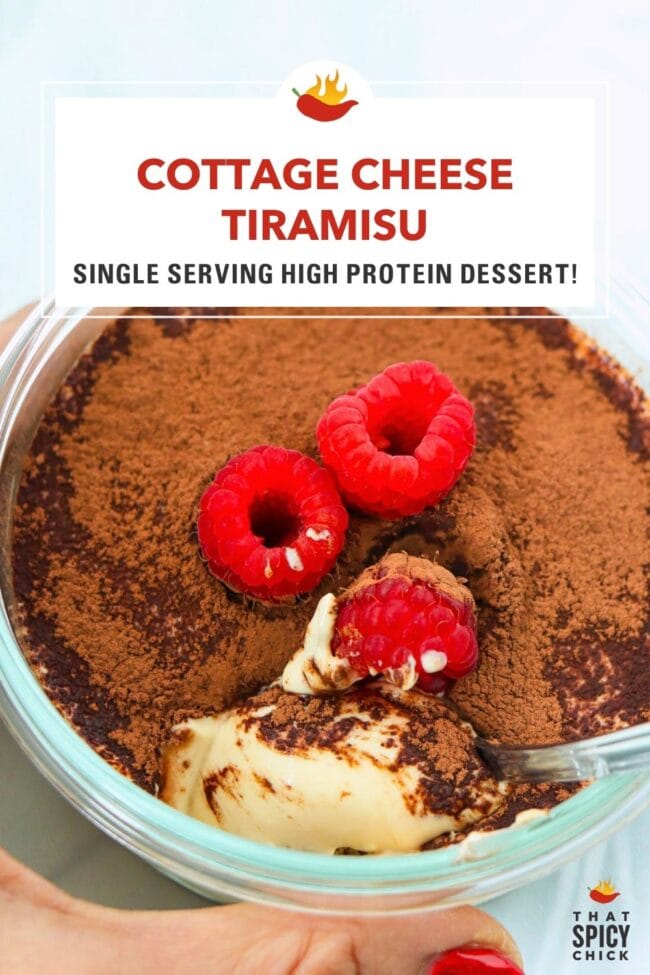 Front view of hand holding a dish with tiramisu and a spoon. Text overlay "Cottage Cheese Tiramisu", "Single Serving High Protein Dessert!" and "That Spicy Chick".