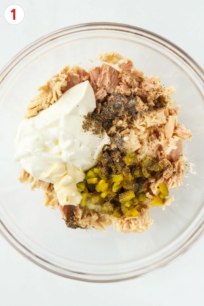 Cottage cheese tuna salad ingredients in a medium bowl.