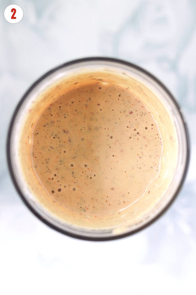 Blended spicy creamy miso silken tofu sauce in a mini blender.