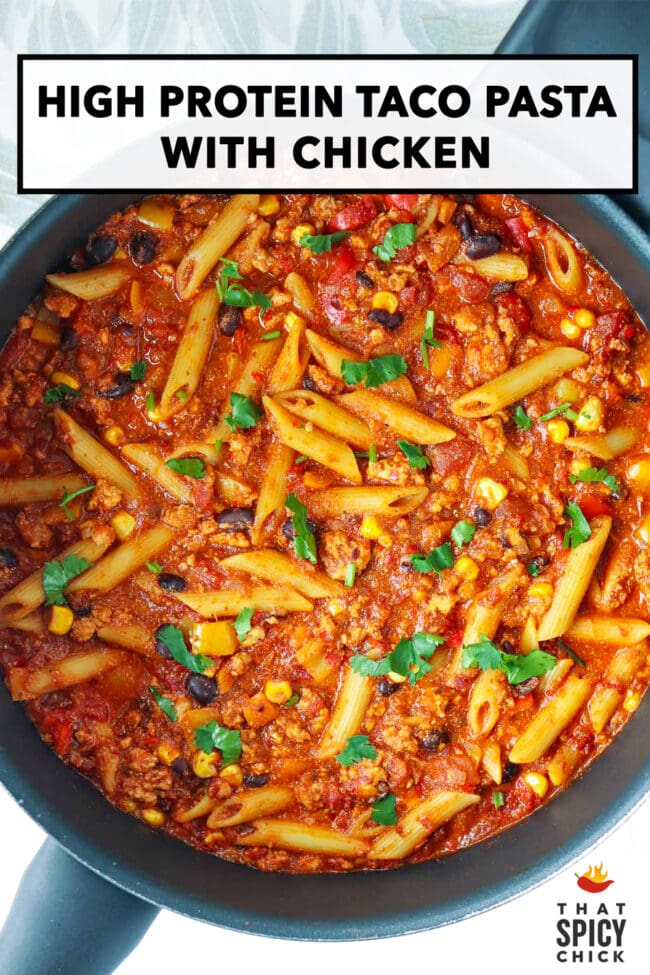 Pan with chicken taco pasta with cottage cheese topped with cilantro. Text overlay "High Protein Taco Pasta with Chicken" and "That Spicy Chick".