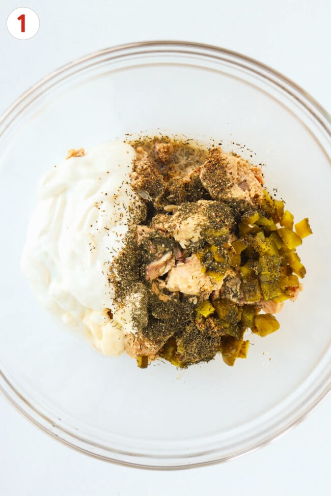 Cottage cheese salmon salad ingredients in a medium bowl.