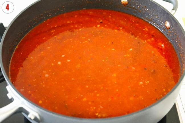 Spicy vodka pasta sauce in a pan on the stovetop.