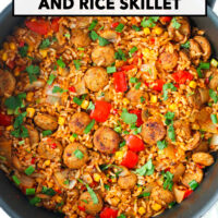 Top view of pan with chicken sausage with rice and veggies. Text overlay "Chicken Sausage and Rice Skillet" and "That Spicy Chick".