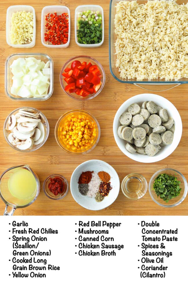 Labeled ingredients for chicken sausage and rice on a wood board.