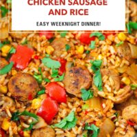 Front view of skillet with chicken sausage, rice and vegetables dish. Text overlay "Chicken Sausage and Rice" and "Easy Weeknight Dinner!".