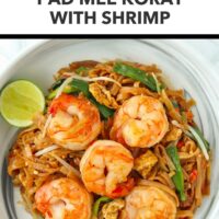 Plate with spicy Thai rice noodles stir-fry with shrimp. Text overlay "Pad Thai's Spicier Cousin!", "Pad Mee Korat with Shrimp", and "That Spicy Chick".