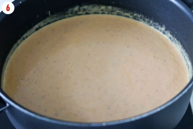 Creamy white bean miso sauce in pan.