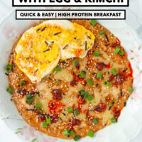 Plate of savory oats topped with chili crisp, cheese, green onions, furikake, and a fried egg. Text overlay "Savory Oatmeal with Egg & Kimchi", "Quick & Easy | High Protein Breakfast" and "That Spicy Chick".