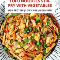 Top view of plate with stir-fried noodles made from tofu and colorful veggies. Text overlay "Tofu Noodles Stir-fry with Vegetables", "High Protein | Low Carb | High Fiber!" and "That Spicy Chick".
