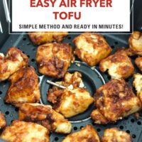 Closeup of air fryer tofu chunks in an air fryer basket. Text overlay "Easy Air Fryer Tofu" and "Simple Method and Ready in Minutes!".