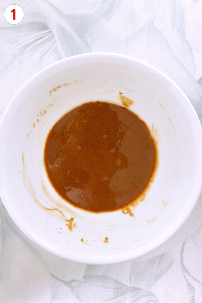 Marinade for air fryer tofu in a white bowl.