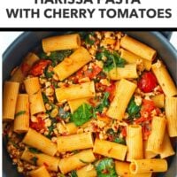 Pan with harissa and cherry tomato pasta with spinach and basil. Text overlay "Easy Weeknight Dinner!", "Harissa Pasta with Cherry Tomatoes" and "That Spicy Chick".